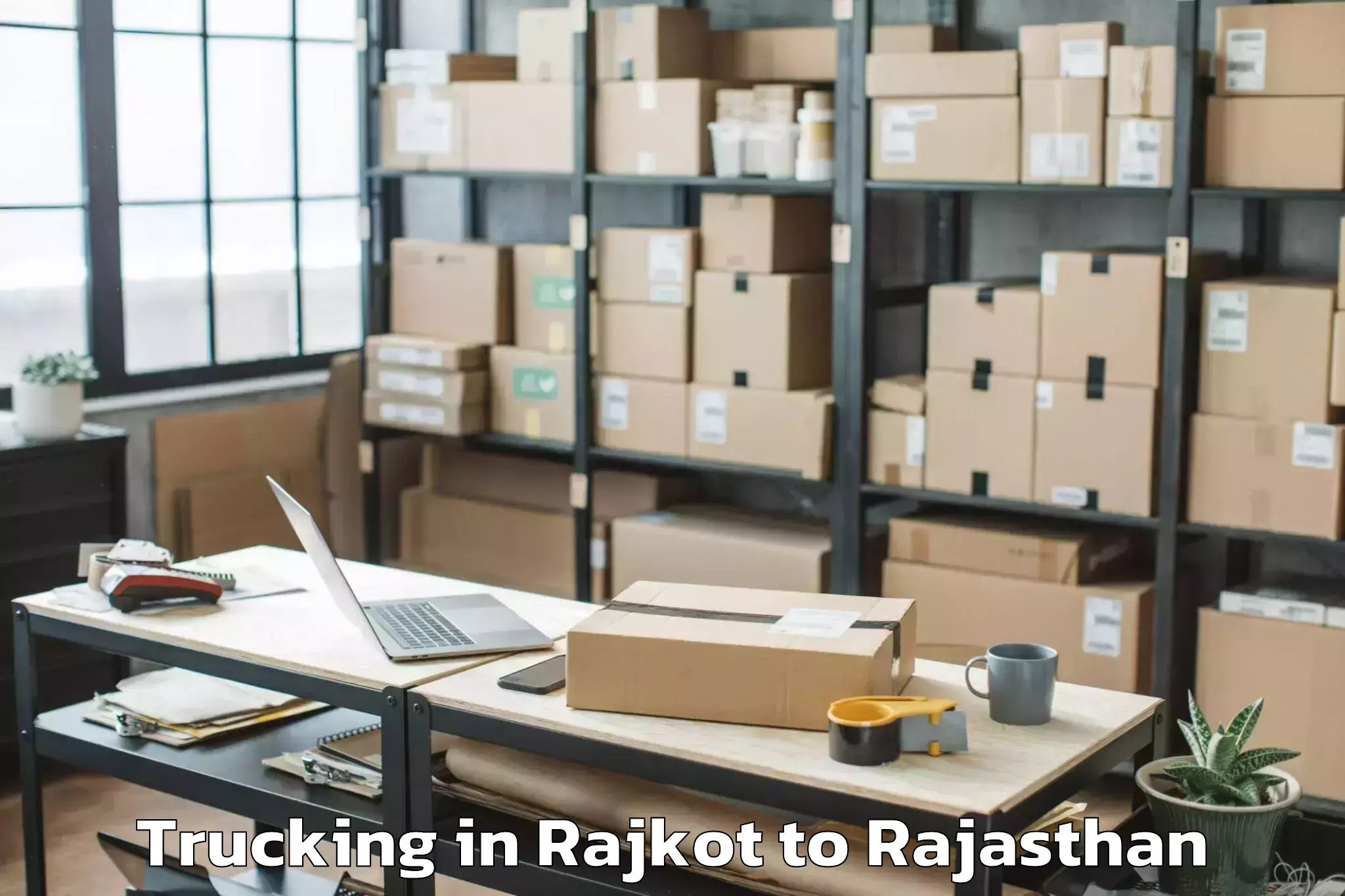 Book Rajkot to Sardar Patel University Of Pol Trucking Online